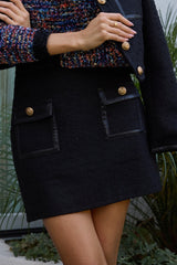 TWEED MINI SKIRT W/ LEATHER TRIM