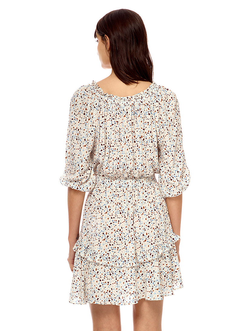 Back of Short mid sleeve polka dot dress with little ruffles