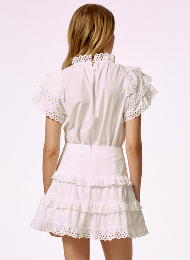 EYELET TRIMMED TIERED MINI SKIRT